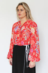 You added <b><u>RIXO Moss Blouse in Peony Flora Red</u></b> to your cart.